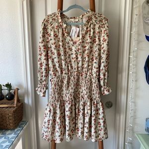 White/cream dress with red floral print